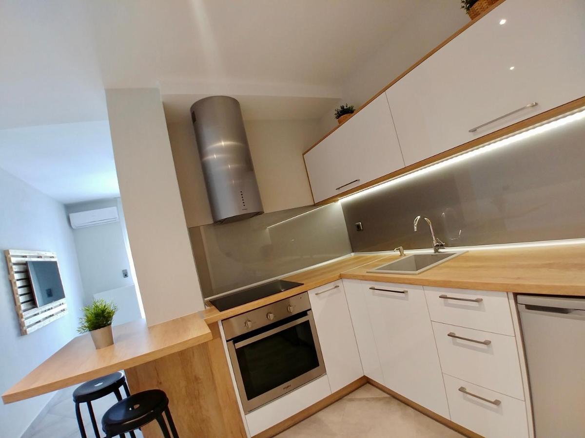 48 Downtown Lofts Apartment เนอาเปรามอส ภายนอก รูปภาพ